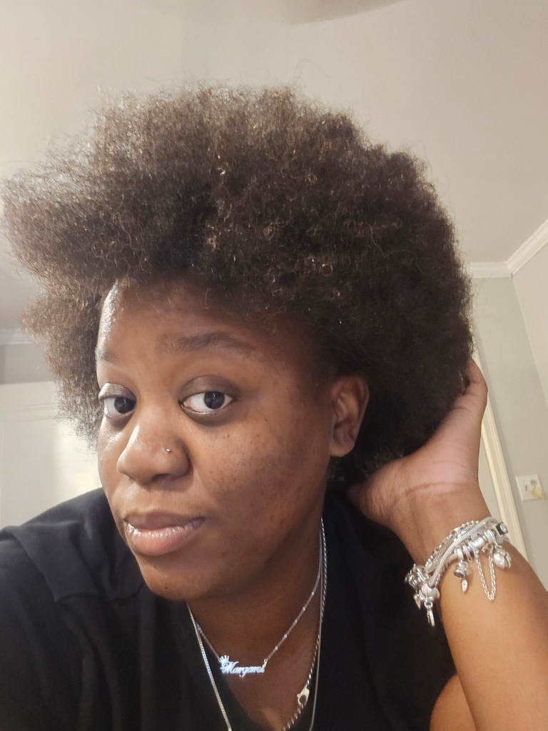 Me with my afro blown out after passing 4 inches of hair. 